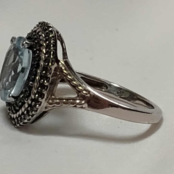 3.10ct Blue Topaz w/ .01ctw Round Black Diamond Accent Rhodium over Silver ring - Picture 5 of 13